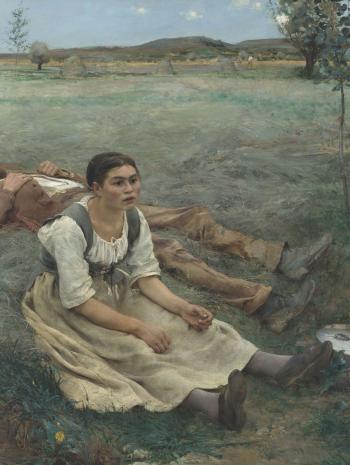 femme assise dans un champ